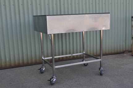 Portable Stainless Steel wash down table.